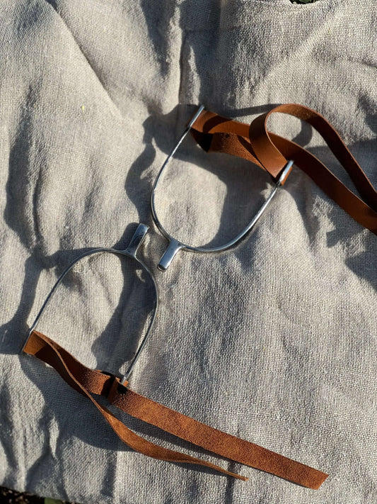 Equestrian spurs with polished steel and genuine leather